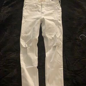 Hollister High rise Skinny white ripped jeans.